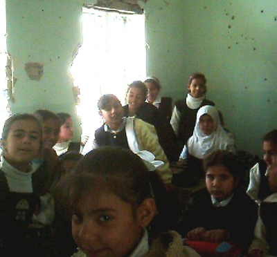 Schoolgirls_in_bulletridden_room